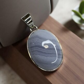 Hänge - blå bandagat oval